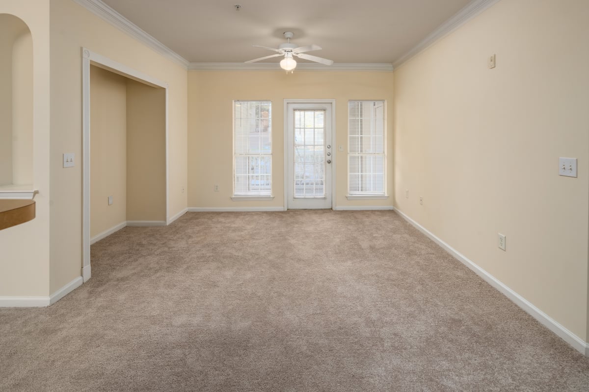 Spacious living room at Wesley Stonecrest Apartments - Stonecrest, GA