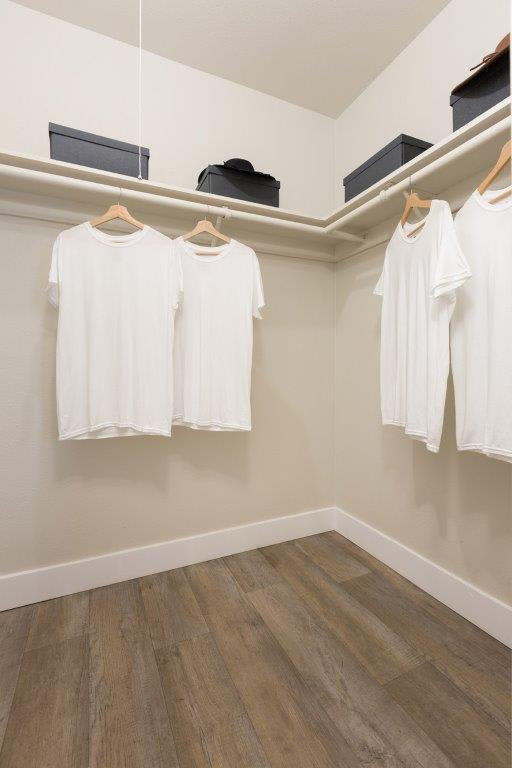Walk-in closet — representative home at Reveal.
