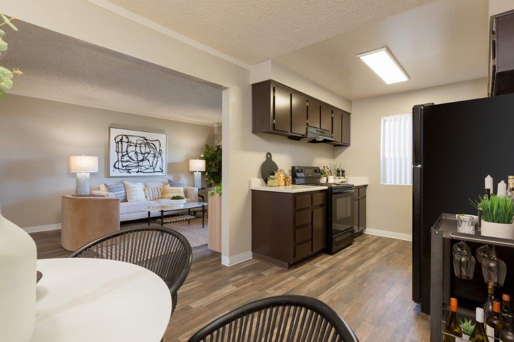 Furnished dining area shown — representative home at Reveal.