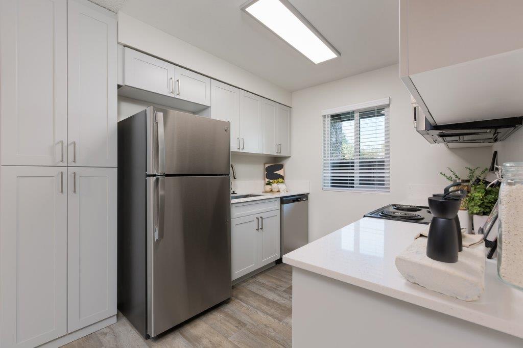 Apartment kitchen — representative home at Reveal.