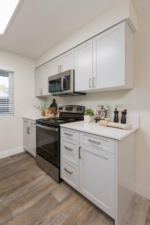 Apartment kitchen — representative home at Reveal.