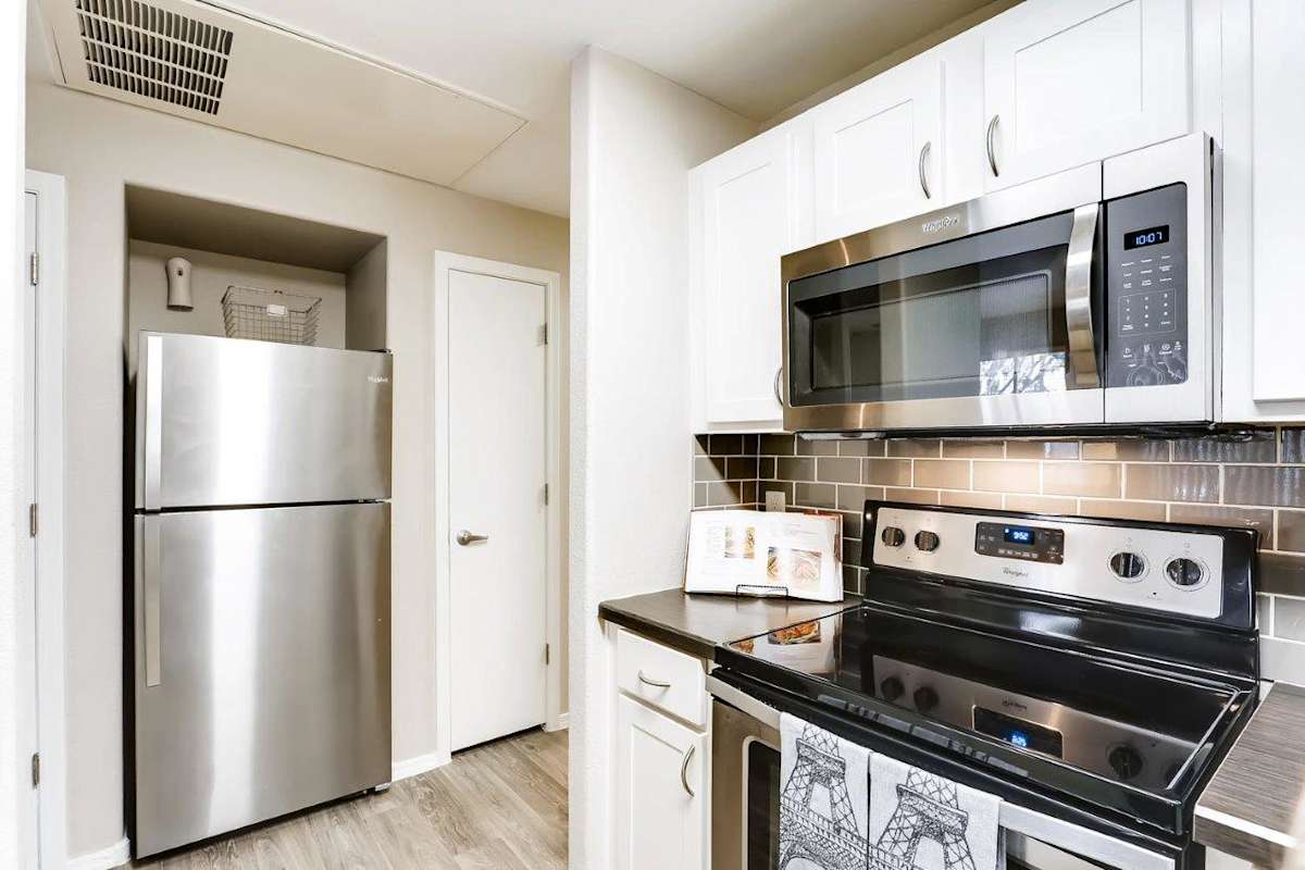 Apartment kitchen — representative home at Bayside Apartments.