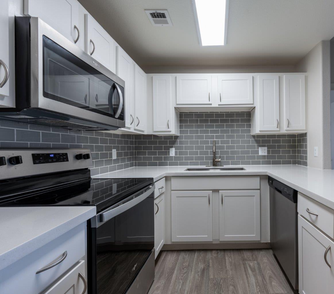Apartment kitchen — representative home at Bayside Apartments.