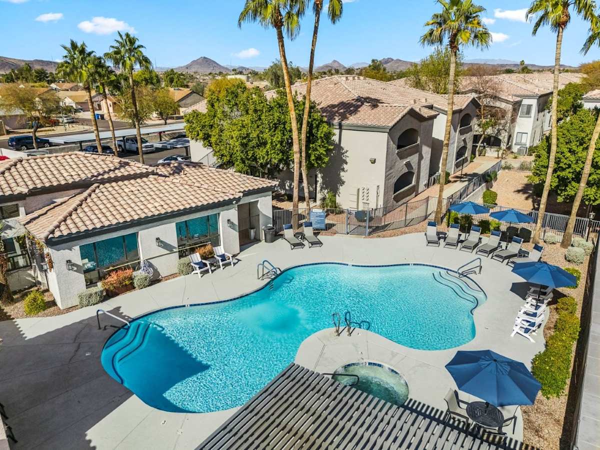 Pool and poolside area at Bayside Apartments.