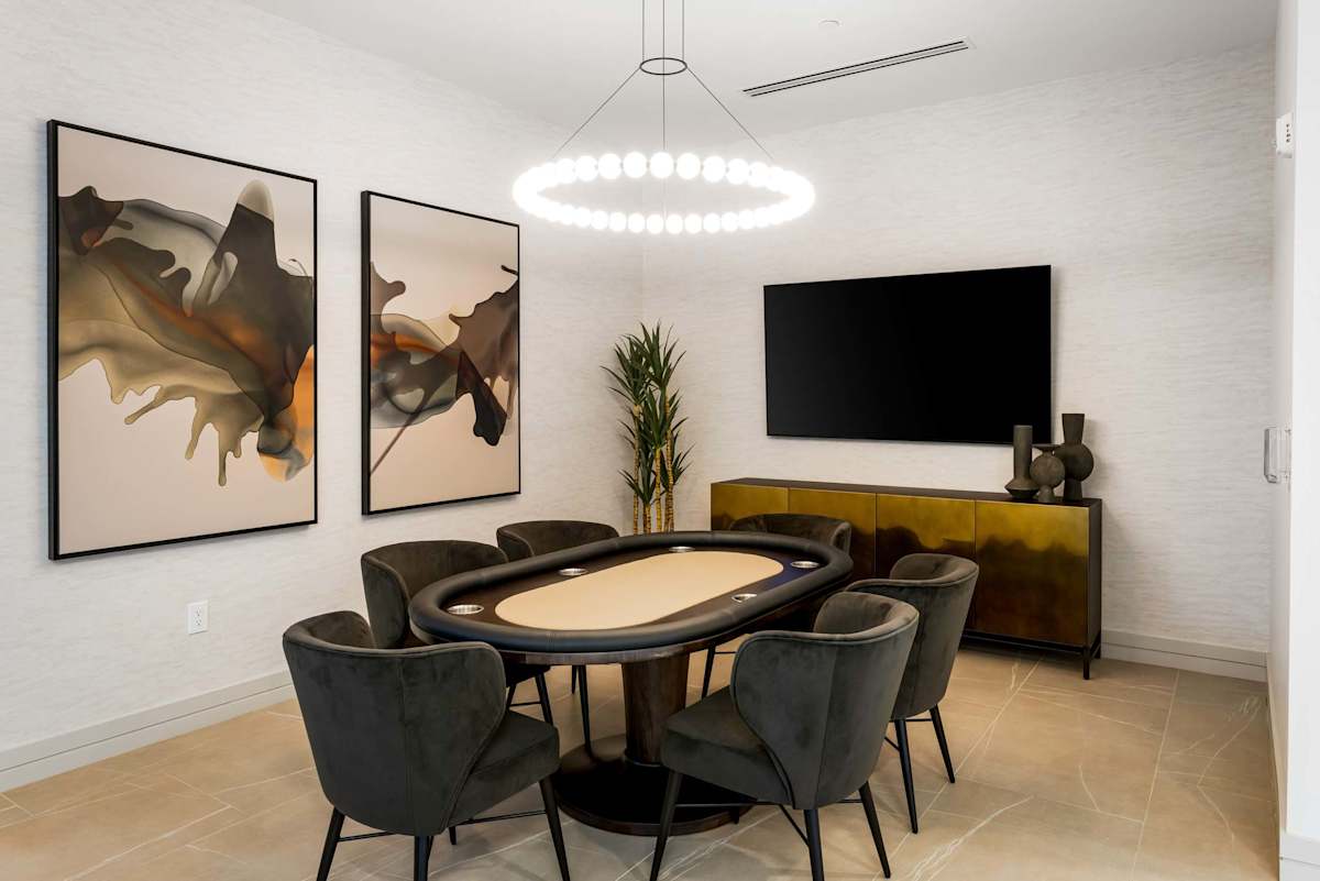 Shared meeting table and television at Elysium.