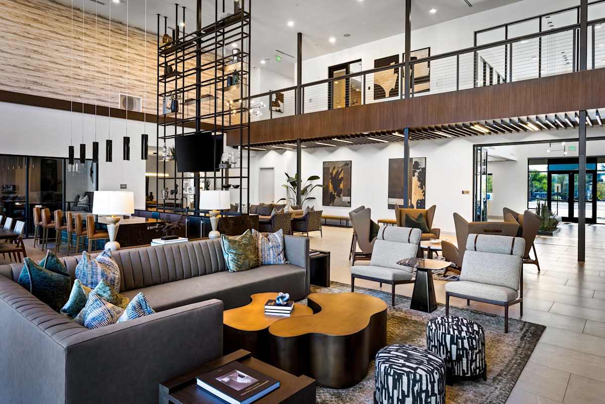 Double-height community lounge at Elysium.