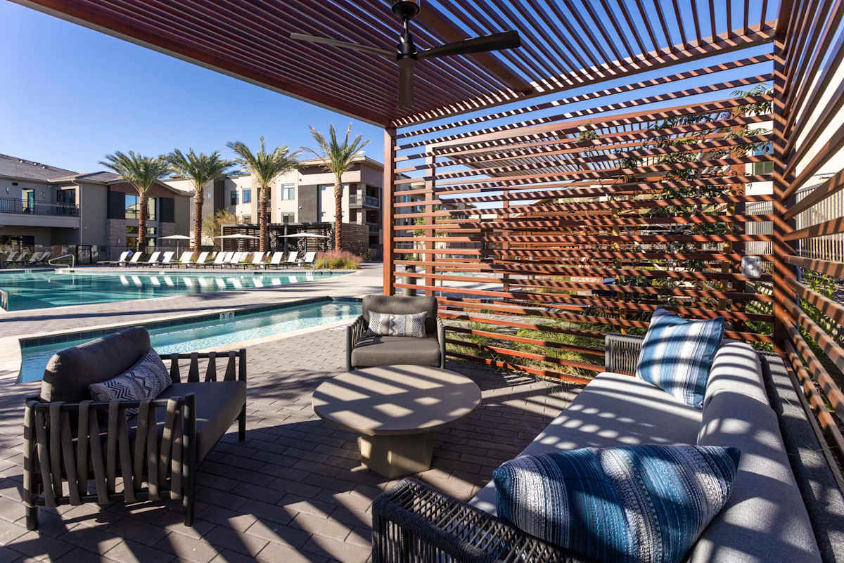 Covered poolside seating at Elysium.