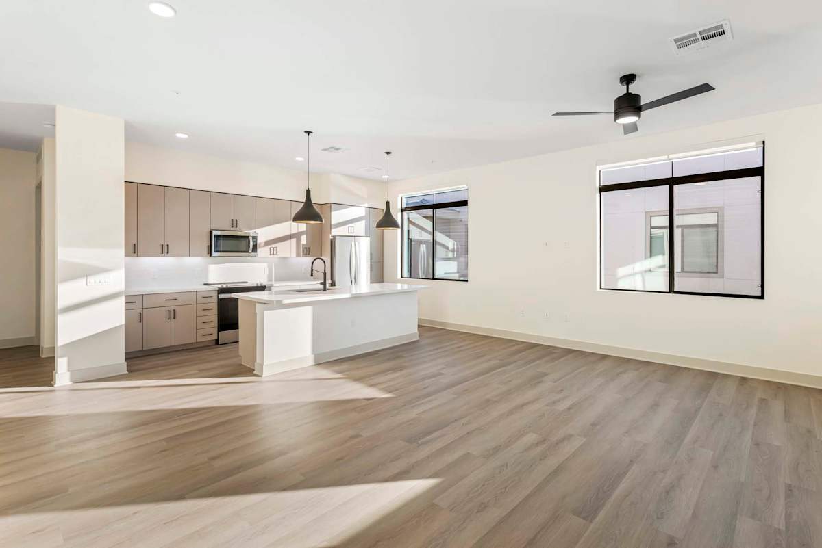 Unfurnished kitchen and living area at Elysium.