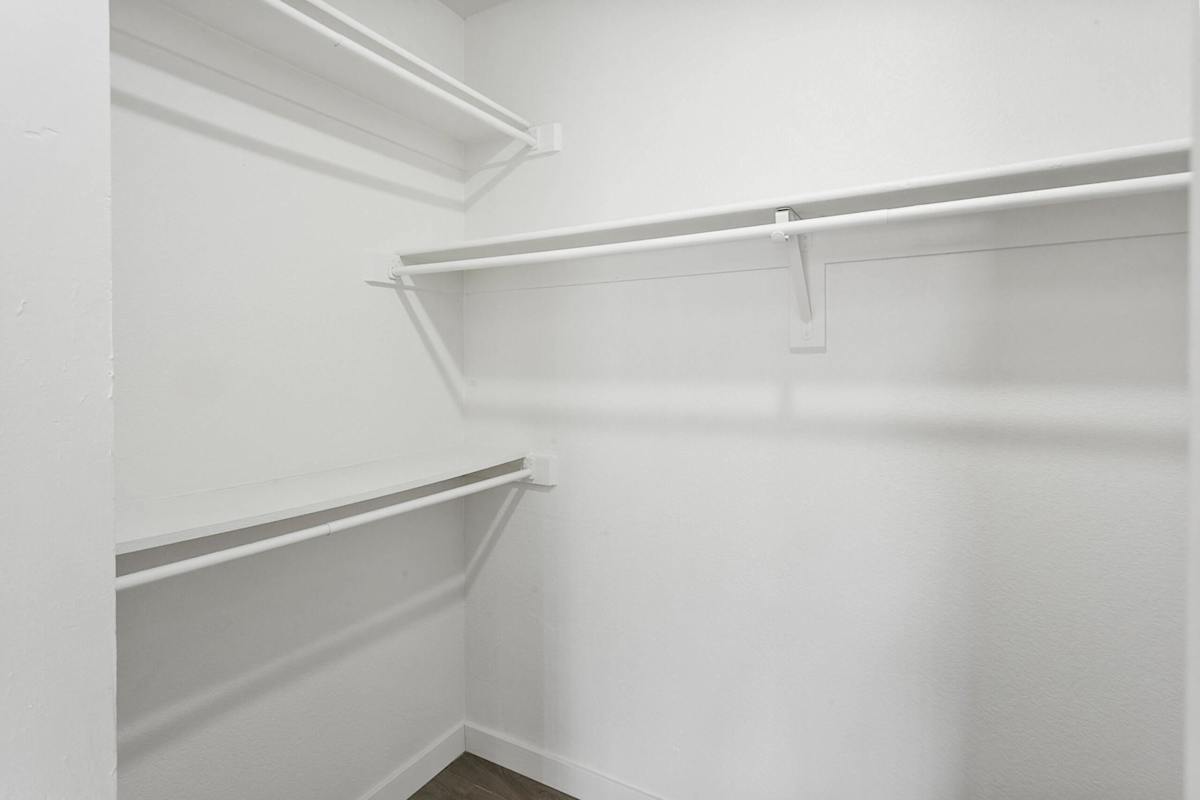 Closet storage — representative home at Villa de Cortez.