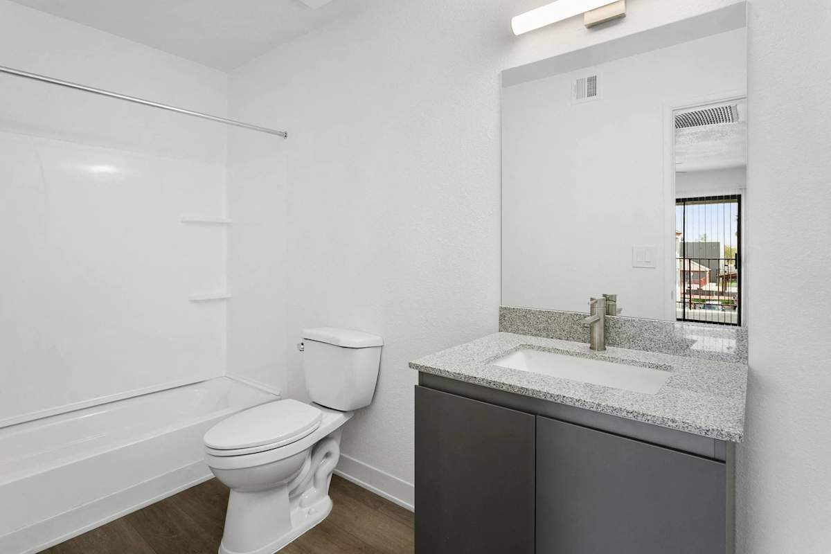 Apartment bathroom — representative home at Villa de Cortez.