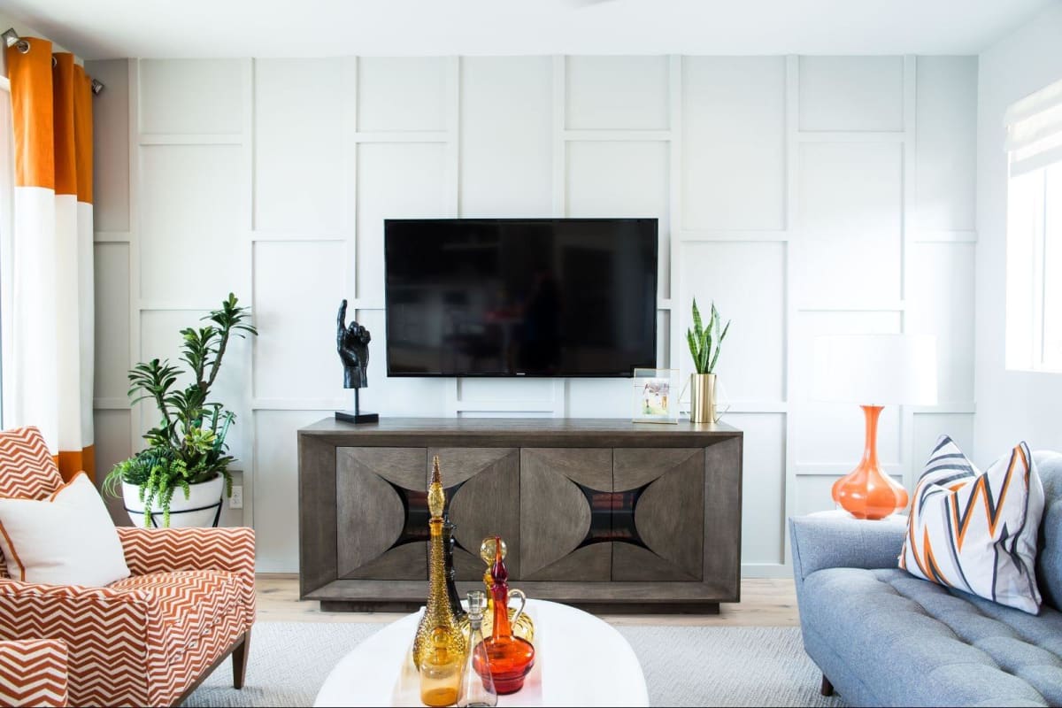 Furnished apartment living area shown — representative home at Novella at Arcadia.