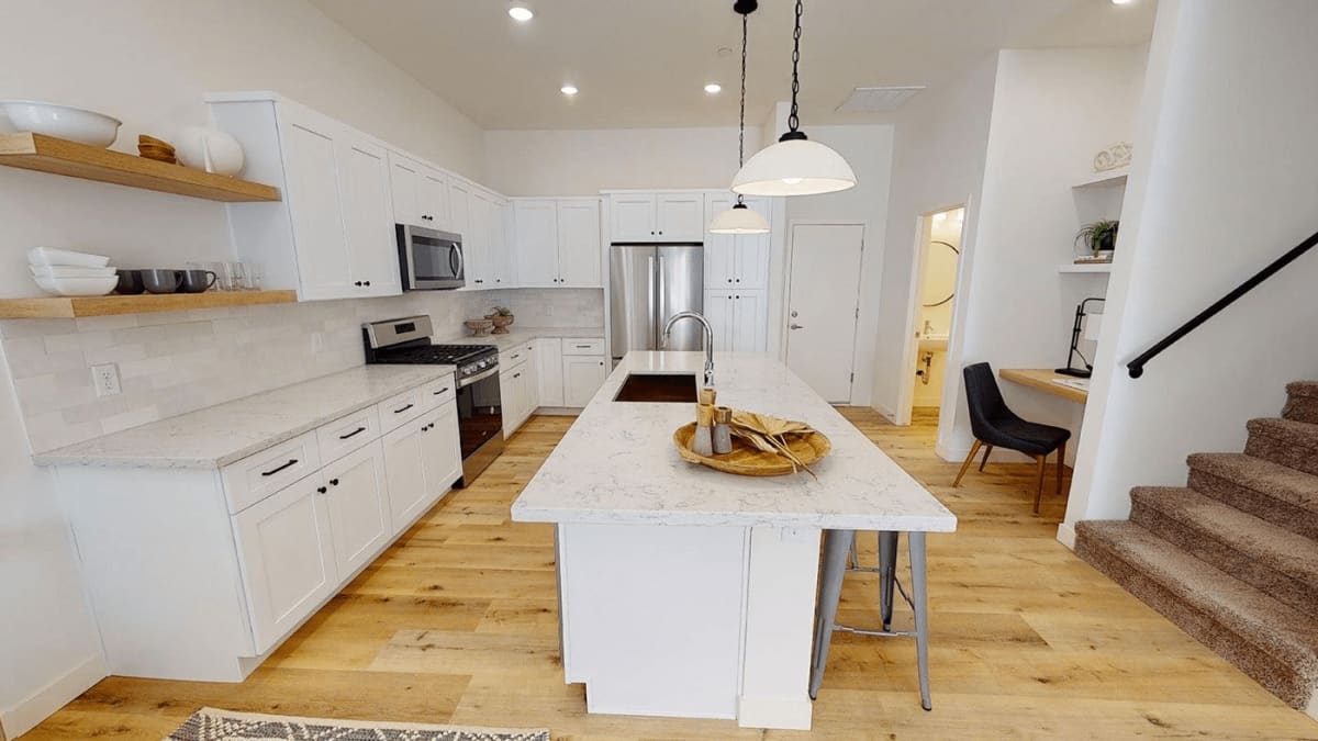 Apartment kitchen — representative home at Novella at Biltmore.