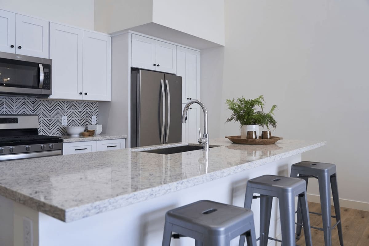 Apartment kitchen — representative home at Novella at Biltmore.
