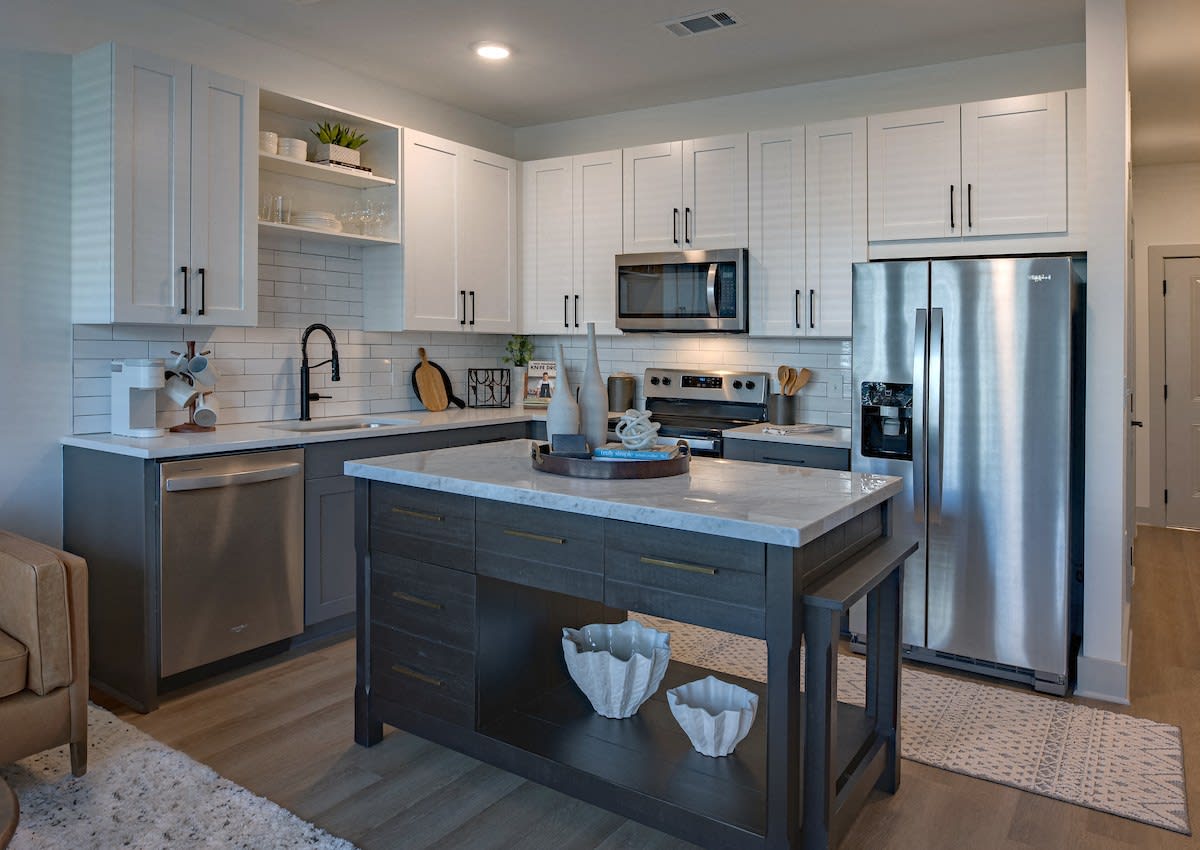 Mainstead at Century Farms Apartments modern kitchen with island - Antioch, TN