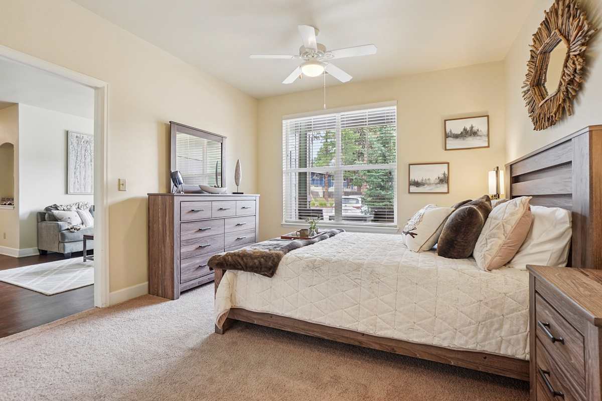 Trail Ridge at Woodland Park Apartments bedroom with dresser - Woodland Park, CO