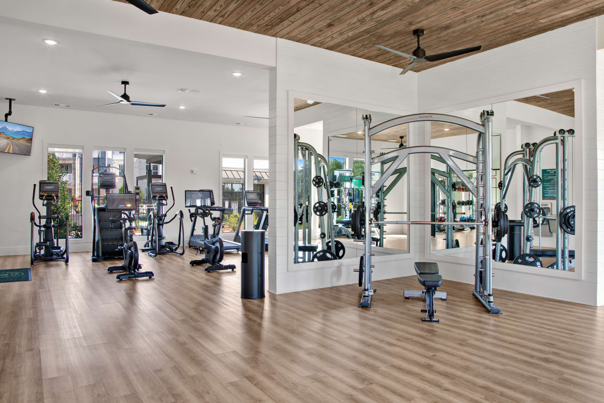 Celadon on Club Apartments fitness center with cardio and weights - Lawrenceville, GA