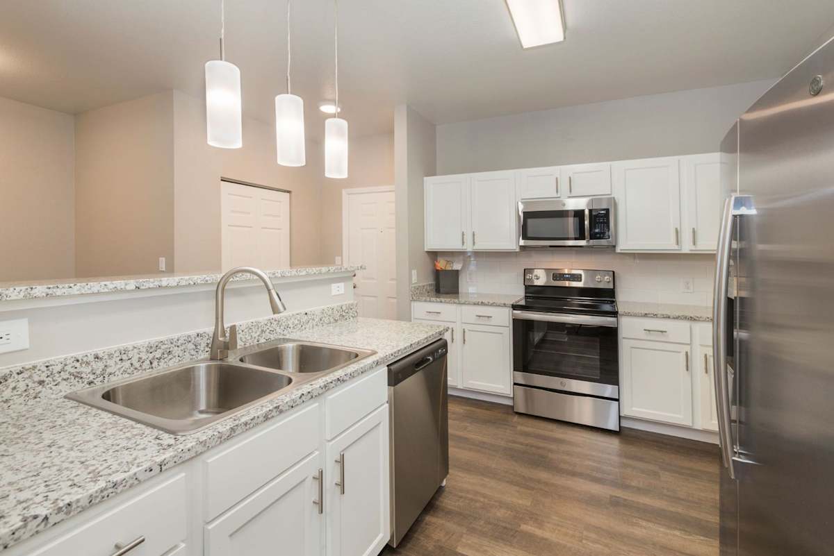 Stetson Ridge Apartments kitchen with stainless appliances - Colorado Springs, CO
