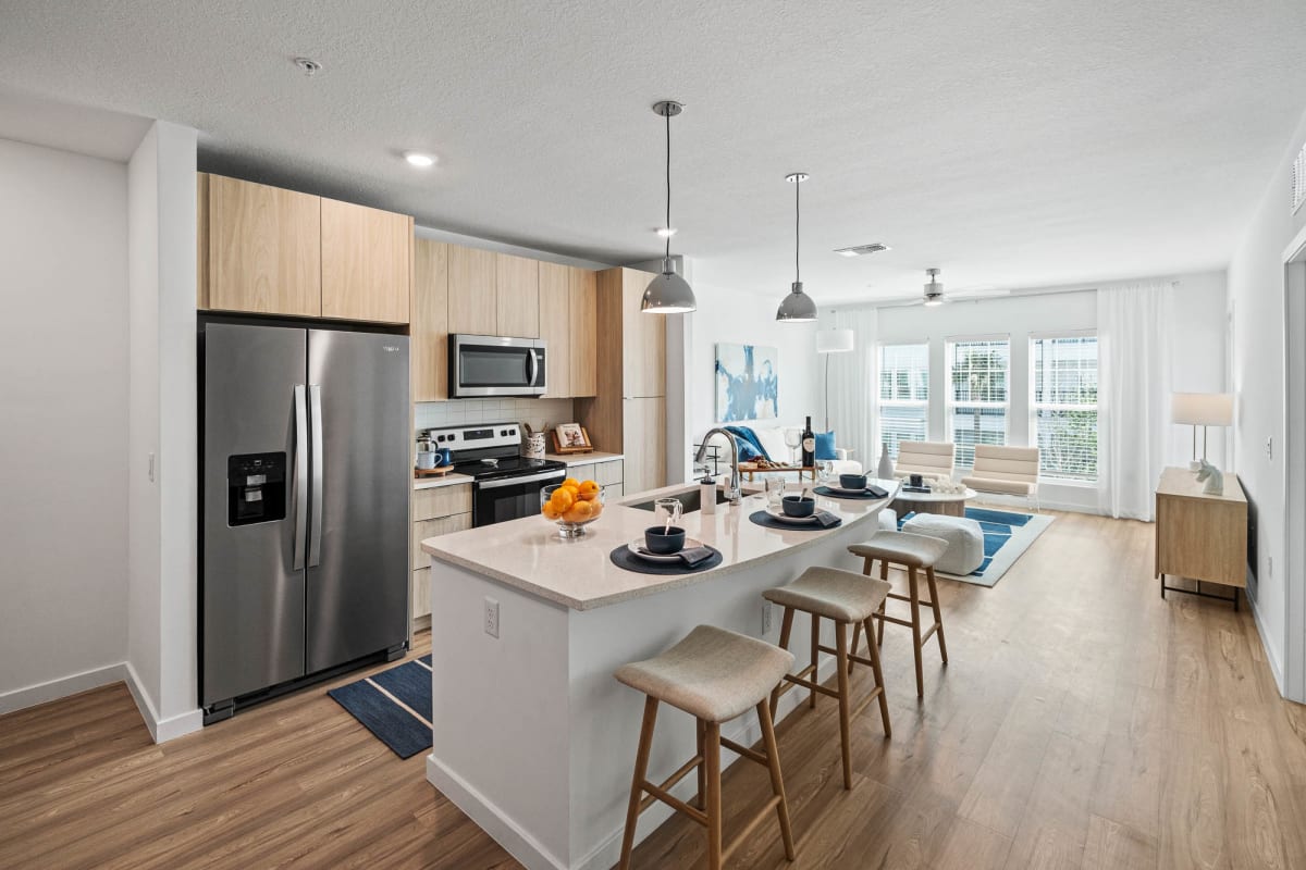 Altis Grand Suncoast model kitchen and living area - Land O' Lakes, FL