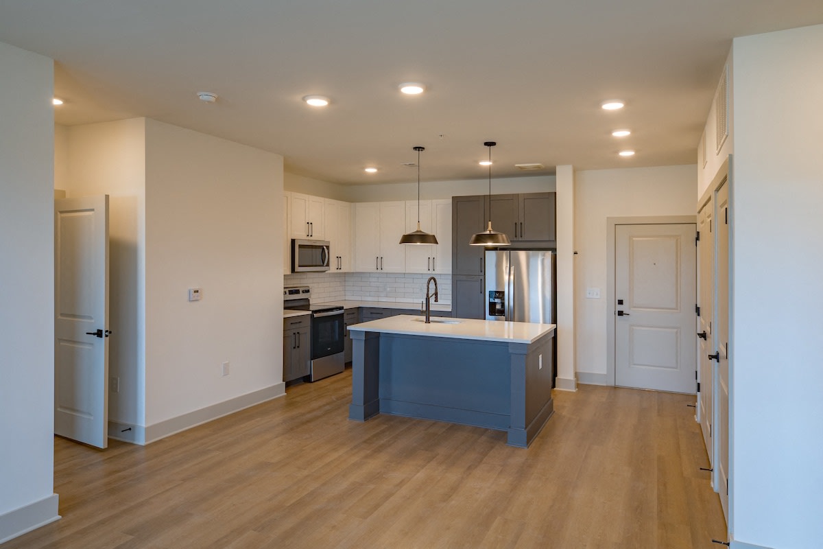 Mainstead at Century Farms Apartments kitchen with blue island - Antioch, TN