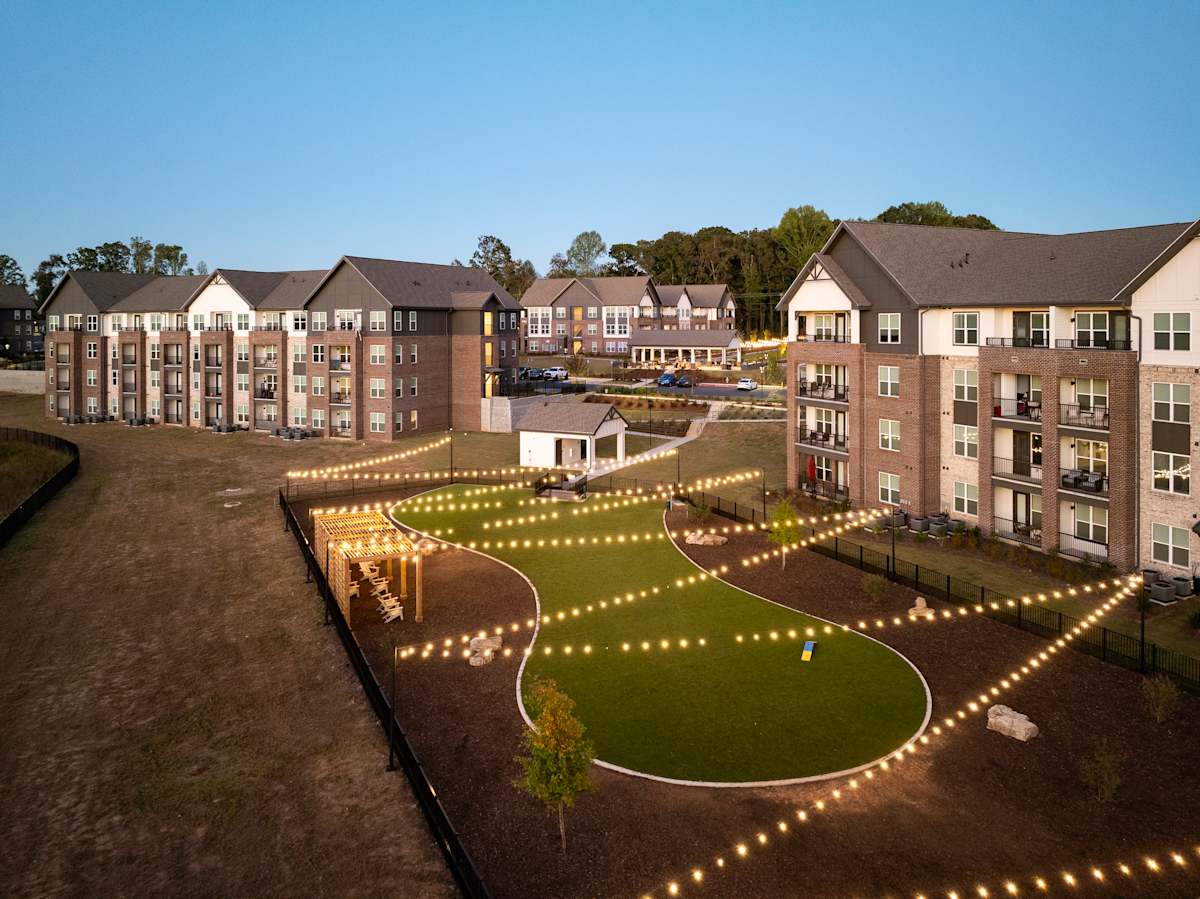 Aura Creekside Apartments aerial view of community courtyard - Cumming, GA
