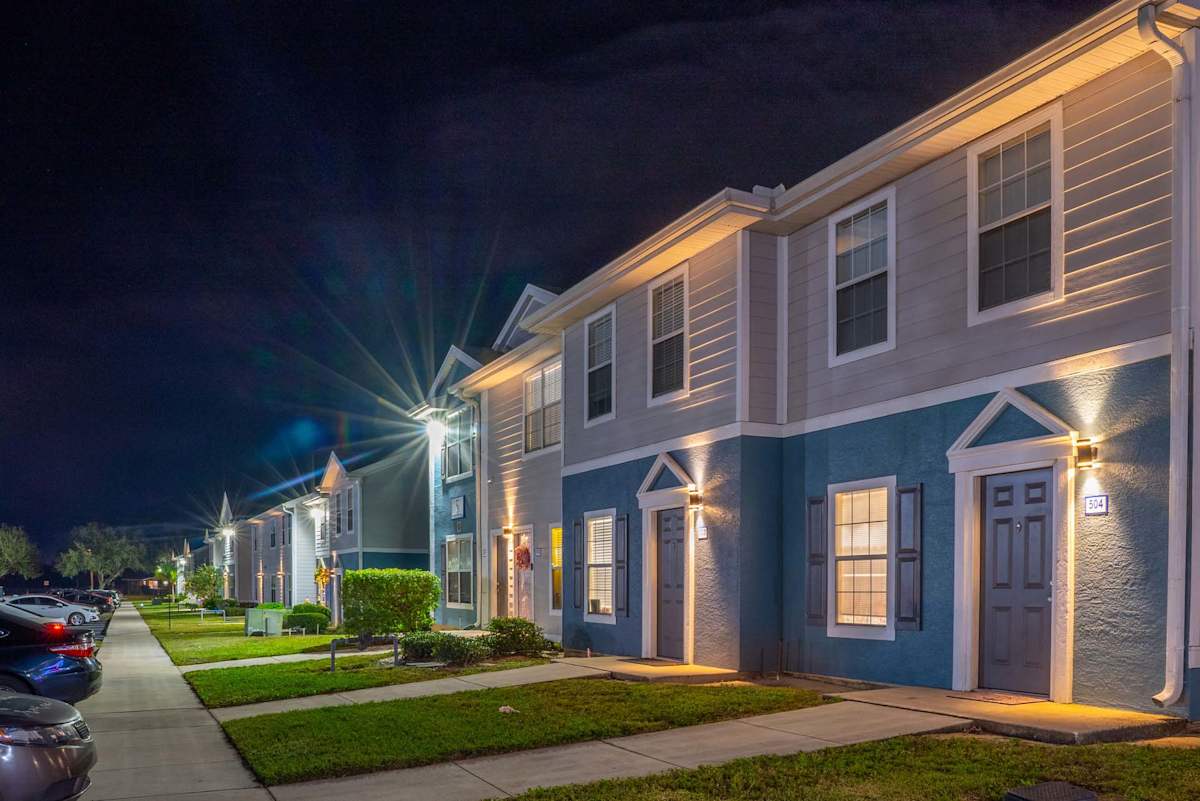 Altair at Lake Tulane Apartments townhome buildings at night - Avon Park, FL