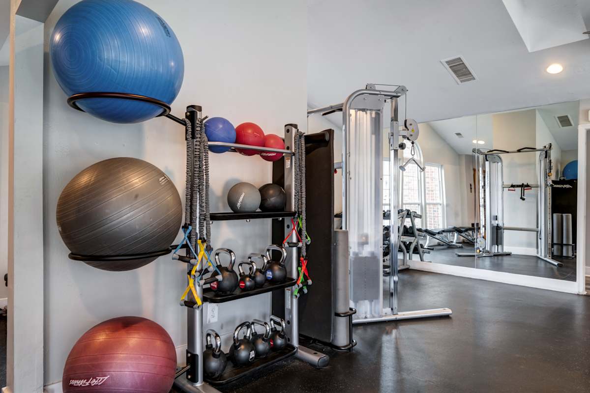 Amberton Apartments fitness room with exercise equipment - Manassas, VA