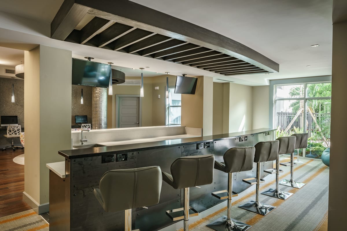 The Retreat at Sawgrass Village apartment kitchen and bar seating - Sunrise, FL