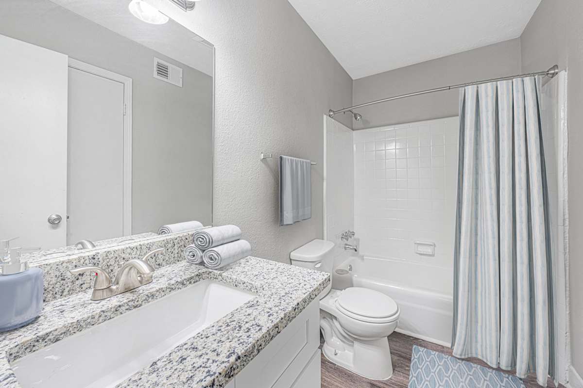 Regency Park Apartments bathroom with shower - East Point, GA