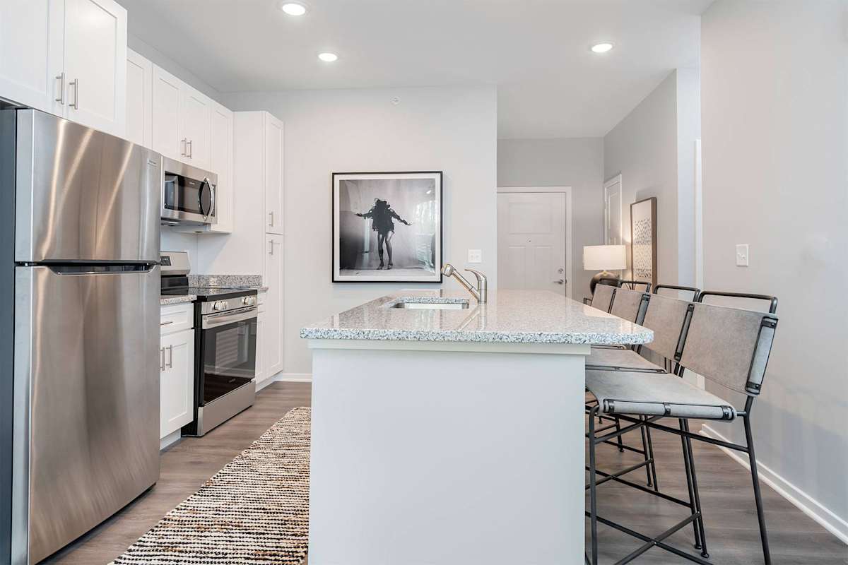 The Retreat Apartments kitchen with island seating - Wyoming, MI