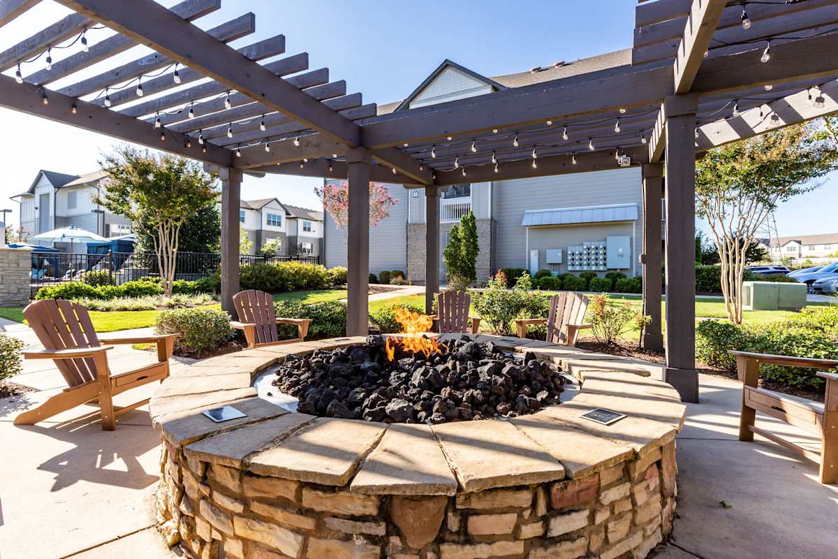 The Aventine Greenville Apartment Homes fire pit seating area - Greenville, SC