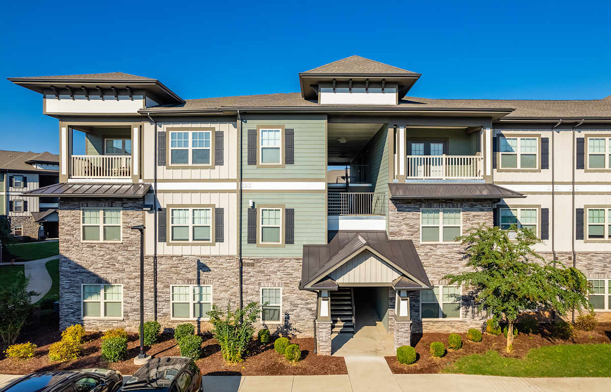 Vintage Blackman Apartments building exterior with parking - Murfreesboro, TN