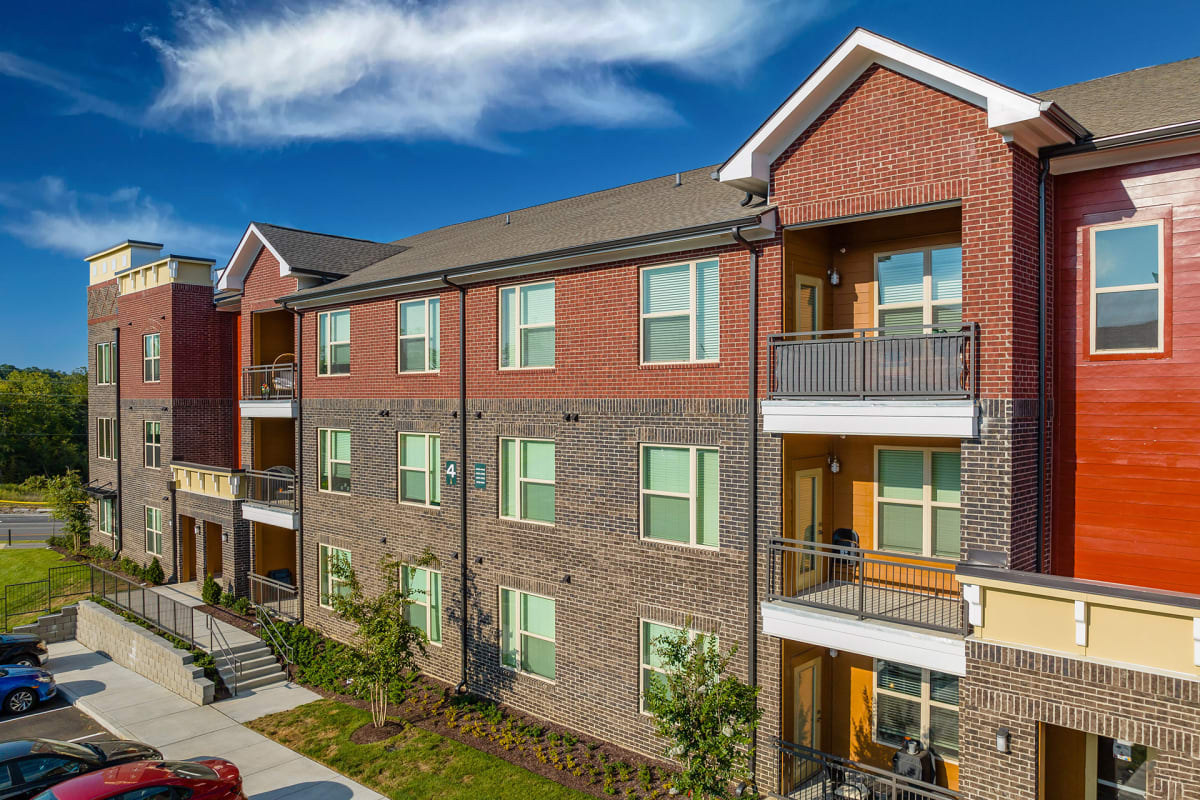 The Enclave at Providence Luxury Apartments brick building exterior with balconies - Mt. Juliet, TN