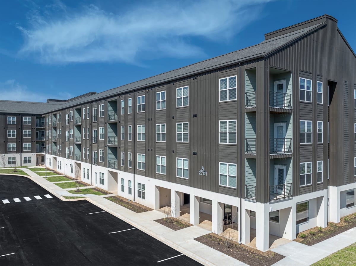 The Grafton Apartment Homes exterior streetside view - Rogers, AR