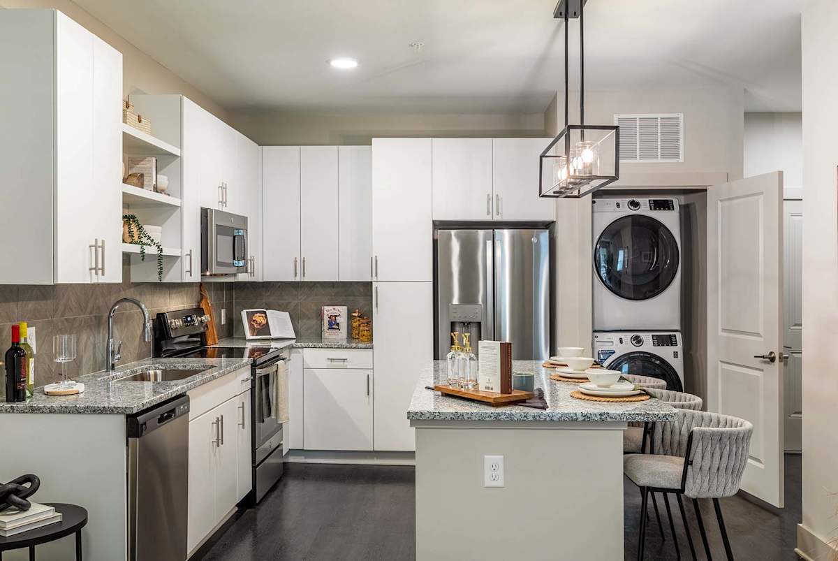 Capital Collective apartment kitchen with stainless appliances - Savannah, GA