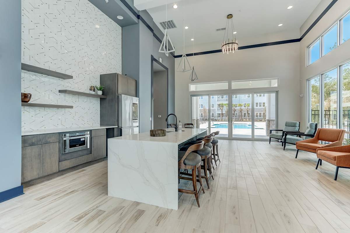 The Howell at the Preserve clubhouse kitchen with island - Jacksonville, FL