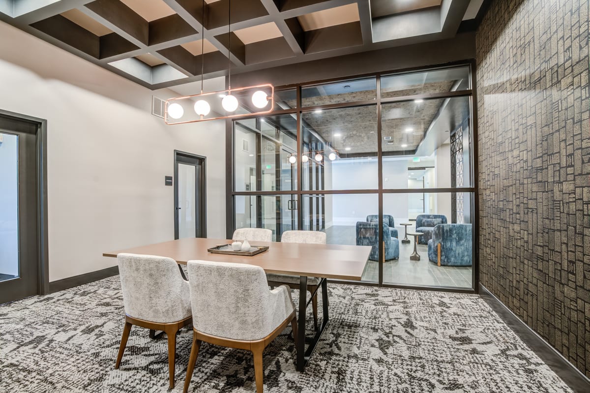 The Dempsey Apartments conference room with large table - Madison, AL
