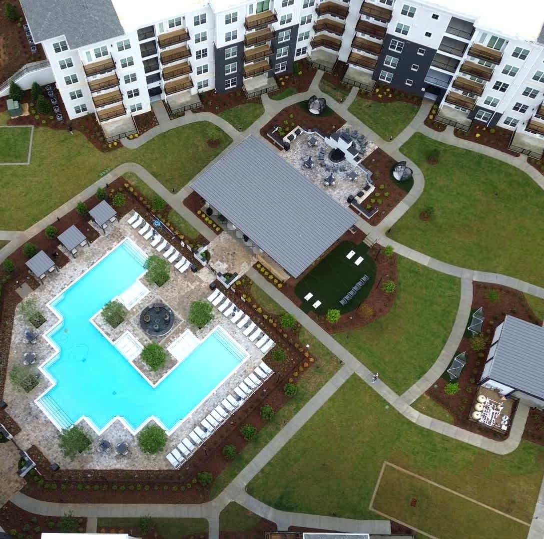 The Collier Sugar Hill Luxury Apartments aerial view of pool area - Sugar Hill, GA