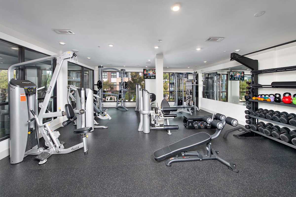 Reserve Decatur Apartments fitness center with strength equipment - Decatur, GA