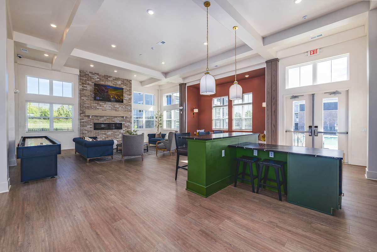 Founders Landing Apartments clubhouse lounge with fireplace - Lebanon, OH