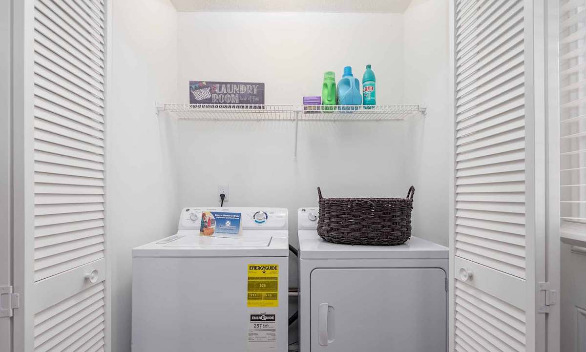 Georgia Green Townhome Apartments laundry room with washer and dryer - Athens, GA