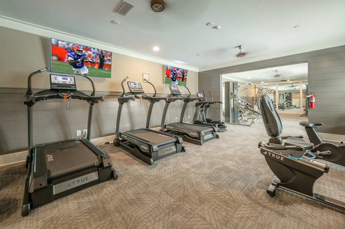 The Reserve Apartments fitness center with treadmills - Gulf Breeze, FL