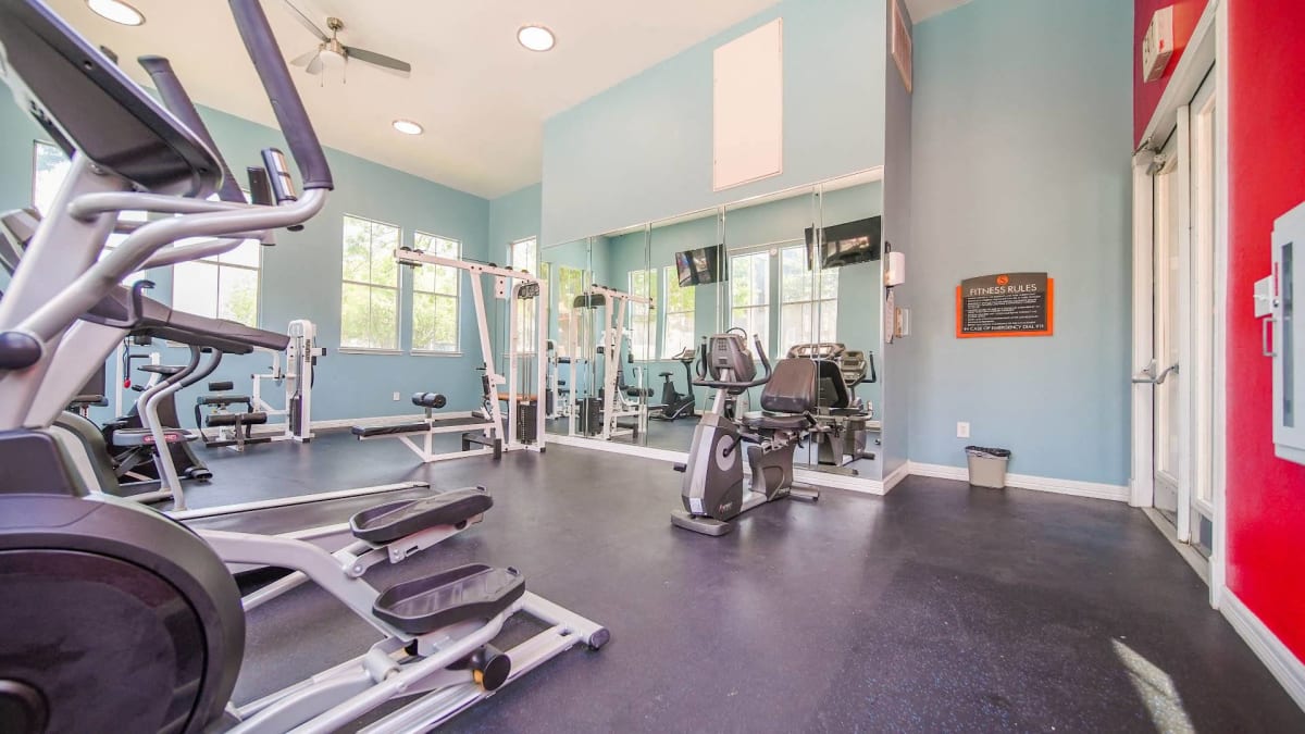 SoCo Park Apartments fitness center with cardio equipment - Austin, TX