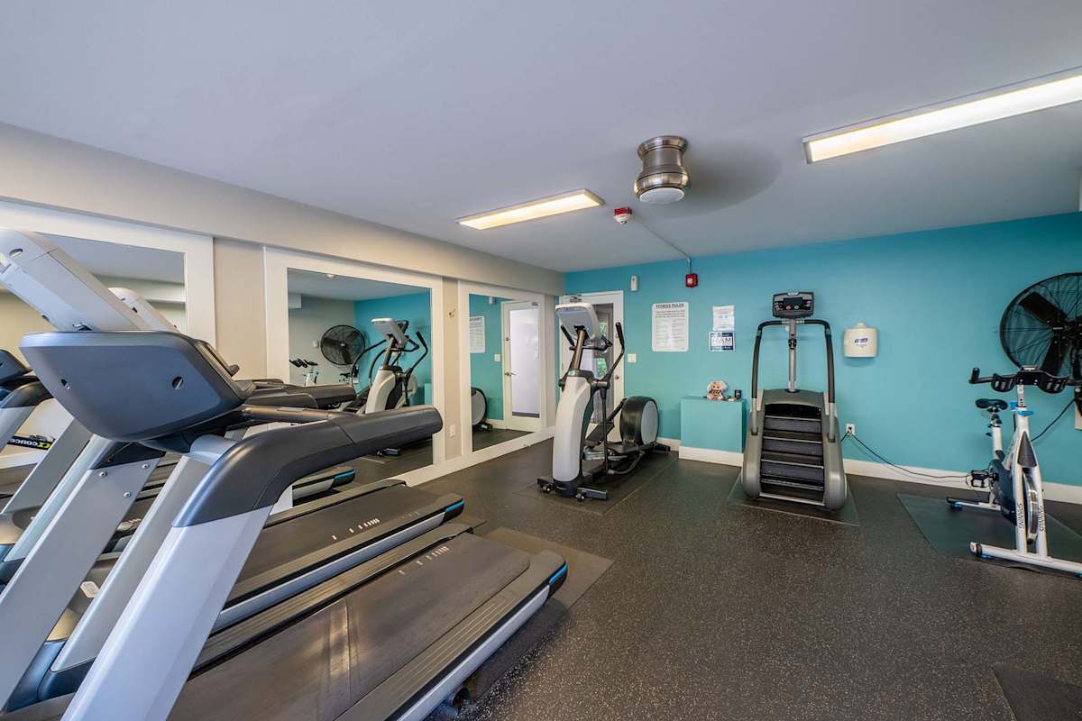 The Regent at Bellevue Way Apartments fitness center with cardio equipment - Bellevue, WA