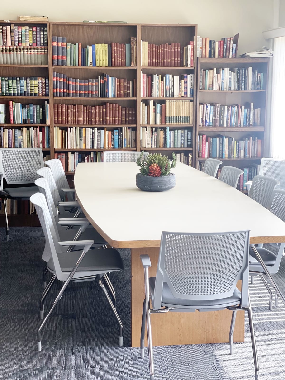 St. Sarkis library area with table and chairs - Dearborn, MI