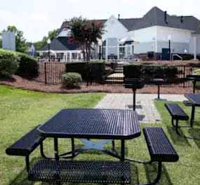 Coffey Creek Apartments picnic area with table and benches - Charlotte, NC