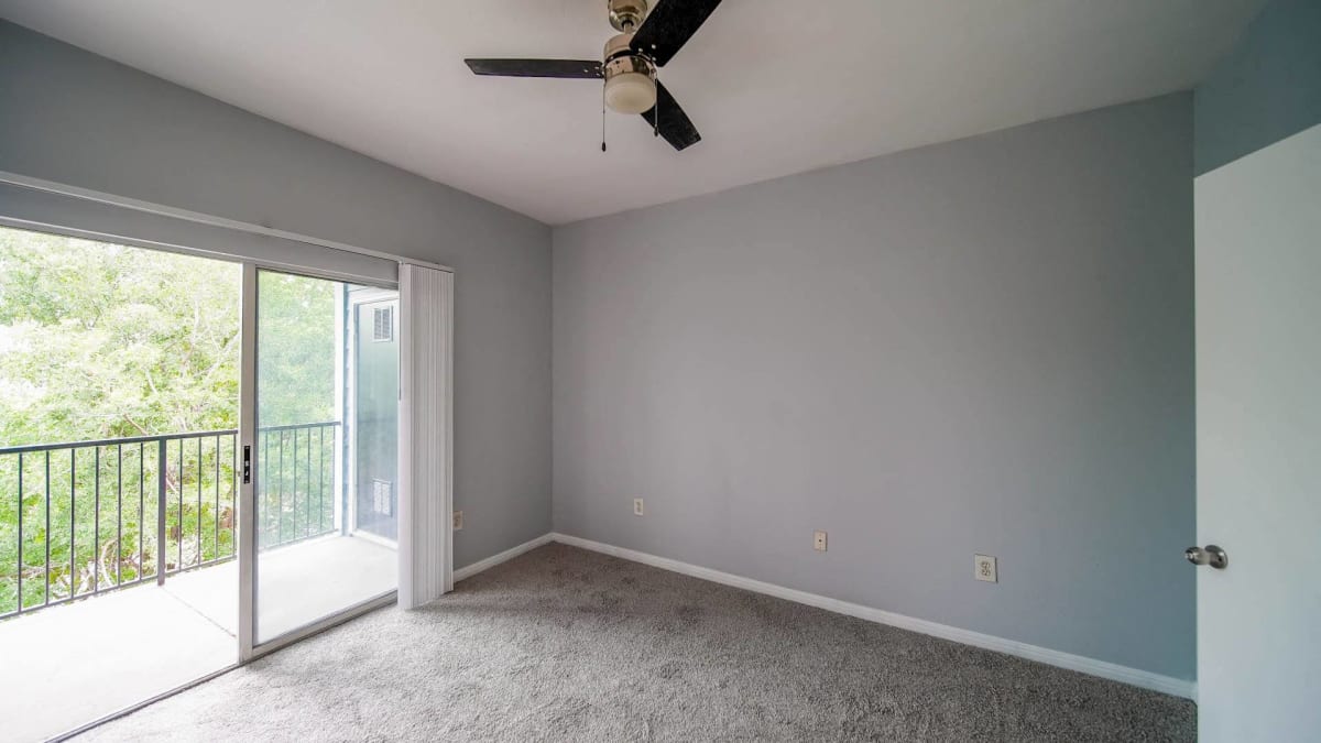 SoCo Park Apartments living room with ceiling fan - Austin, TX