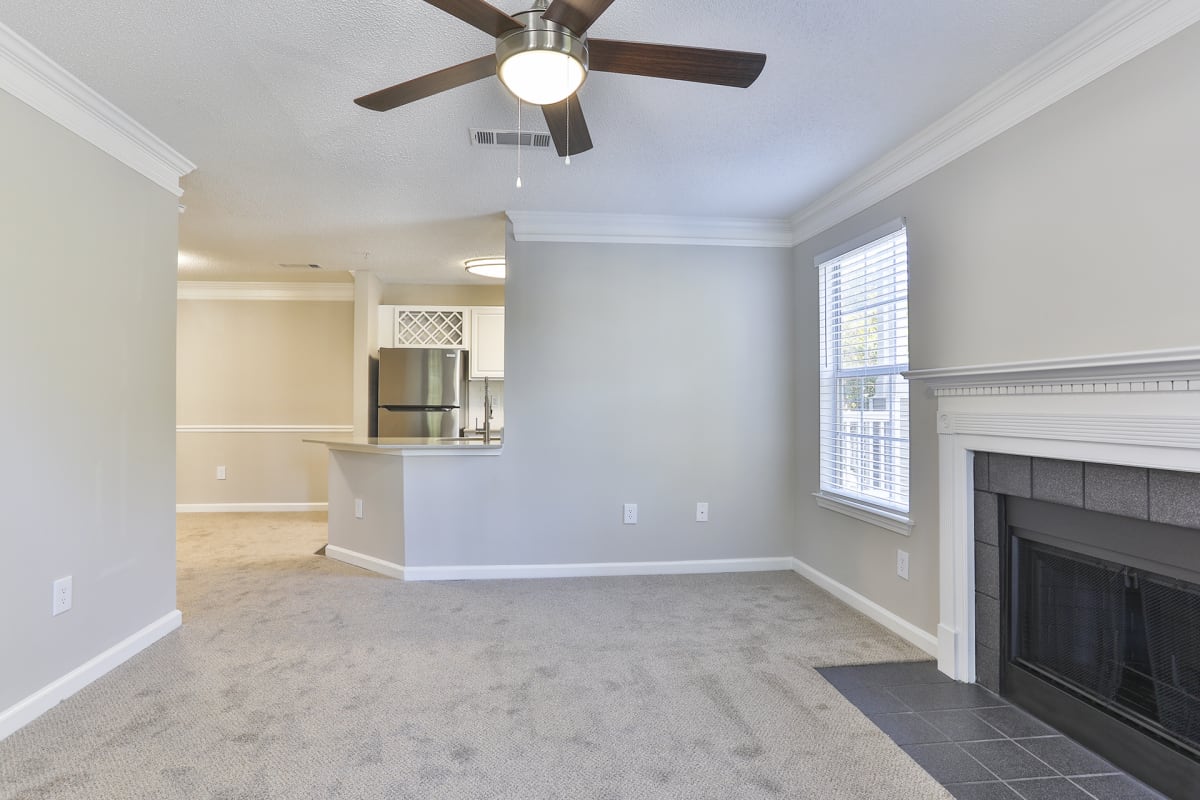 Crestmont at Thornblade Apartments living room with fireplace - Greenville, SC