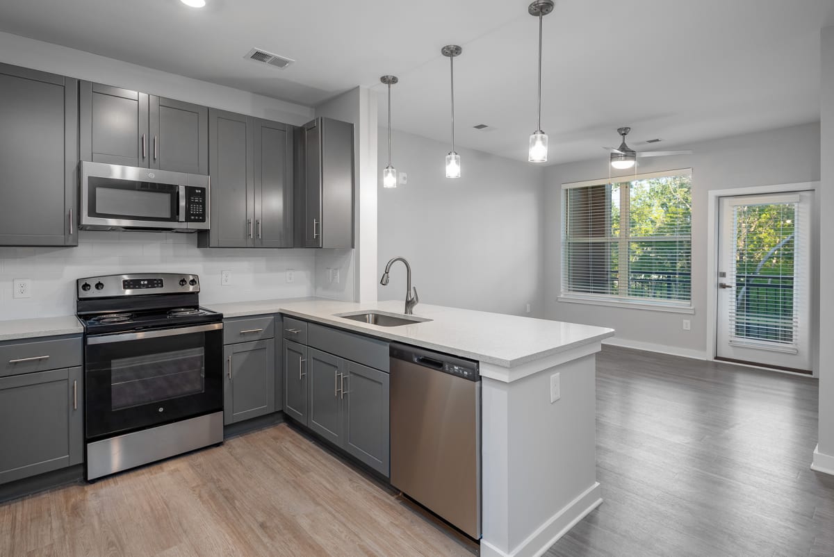 The Enclave at Providence Luxury Apartments kitchen with breakfast bar - Mt. Juliet, TN