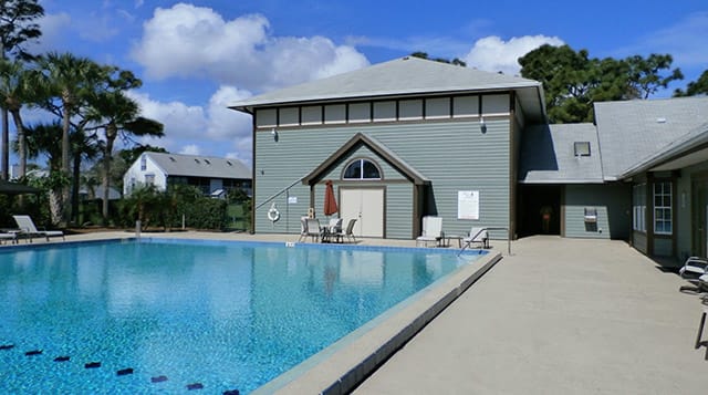 Lake in the Woods Apartments pool - Melbourne, FL