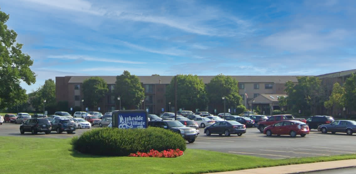 Lakeside Village parking area and building view - Saginaw, MI
